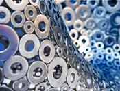 Large assortment of similar washers