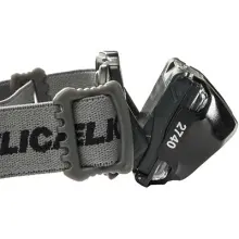 Detail of headlamp mechanism attached to cloth strap