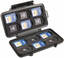 Open pelican memory card case with cards in it