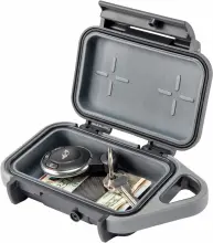 a black pelican Go case, open, containing keys, money, and credit cards