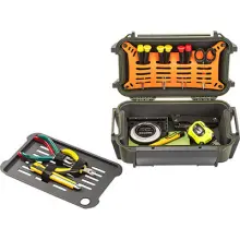 a green Pelican R60 ruck case, open with the divider tray removed, containing a variety of small hand tools