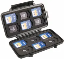 Open pelican memory card case with cards in it